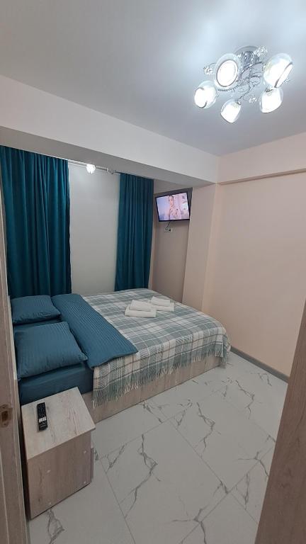 Ένα ή περισσότερα κρεβάτια σε δωμάτιο στο Sanmarko