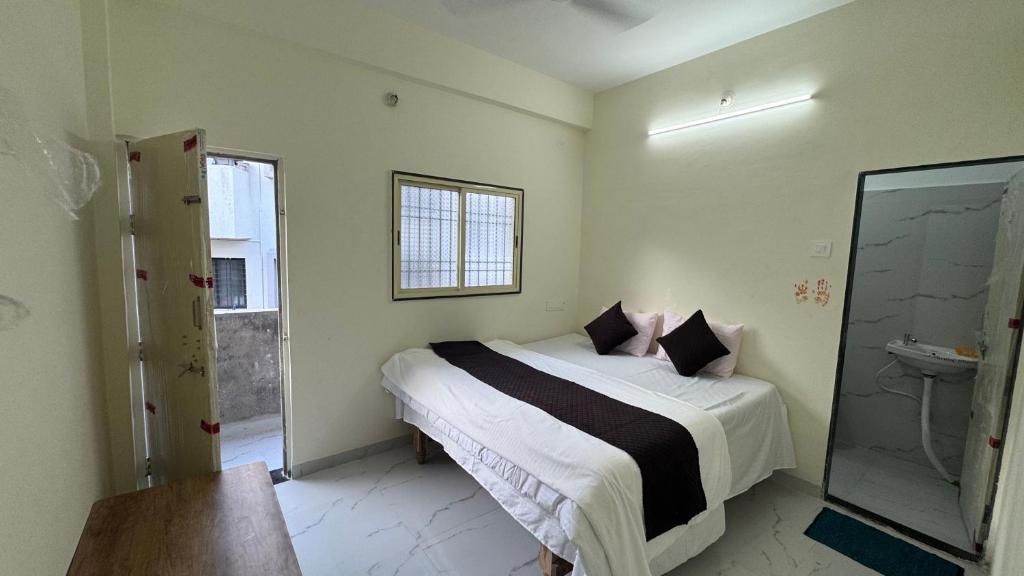 Voodi või voodid majutusasutuse The Courtyard Palace toas