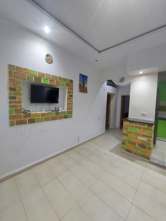 TV a/nebo společenská místnost v ubytování Rez-de-chaussée garage wifi 5Ggratuit gaz de ville