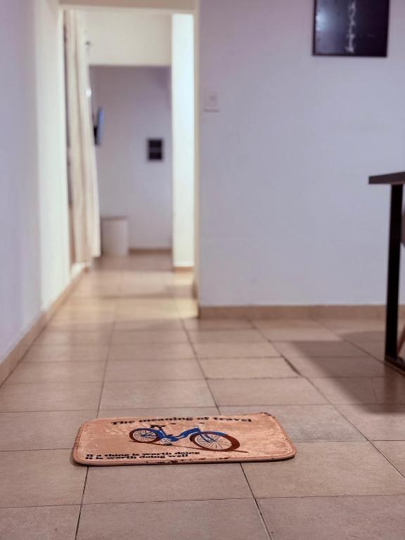 a rug on the floor of a hallway at Alquiler Apartamento Resistencia Chaco in Resistencia