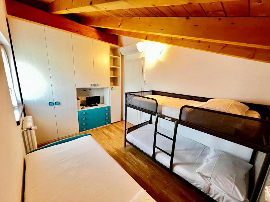 Postel nebo postele na pokoji v ubytování Sonhozinho House Colico