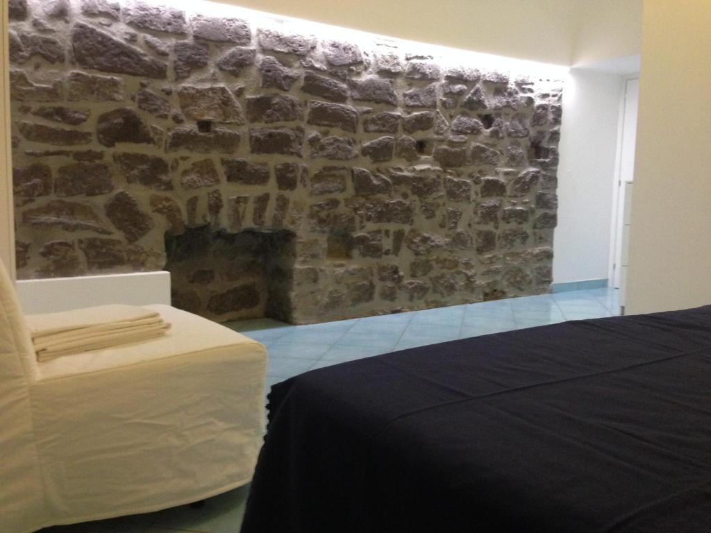 Posteľ alebo postele v izbe v ubytovaní B&B La Grotta Marina