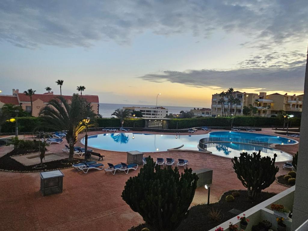 a view of a swimming pool in a resort at Sunny Suite in San Miguel de Abona