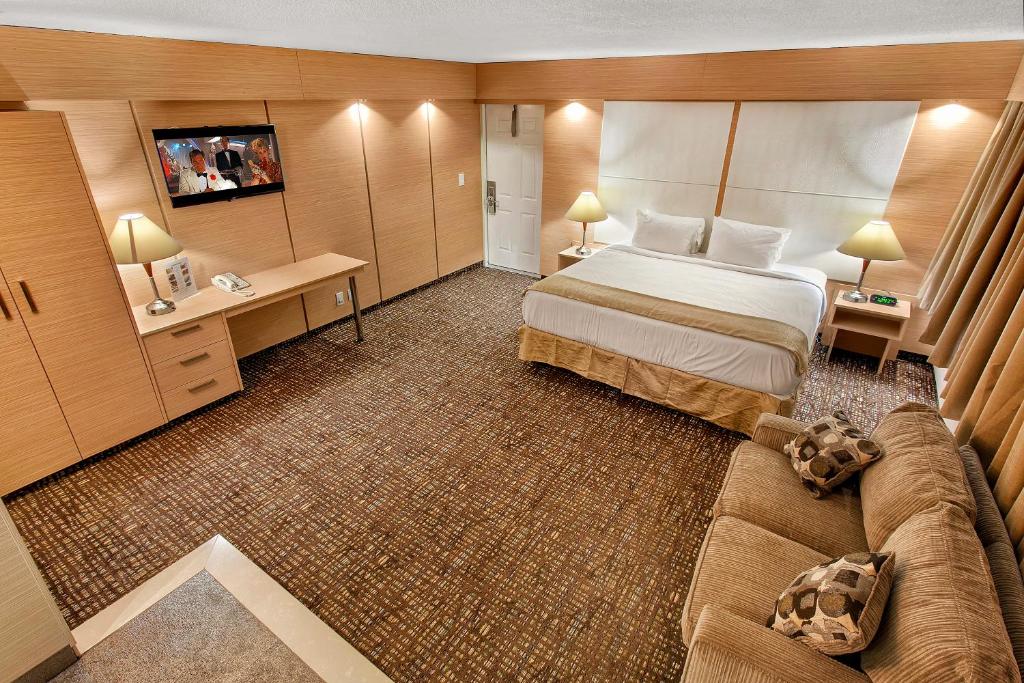 Postel nebo postele na pokoji v ubytování Ocean Beach Club