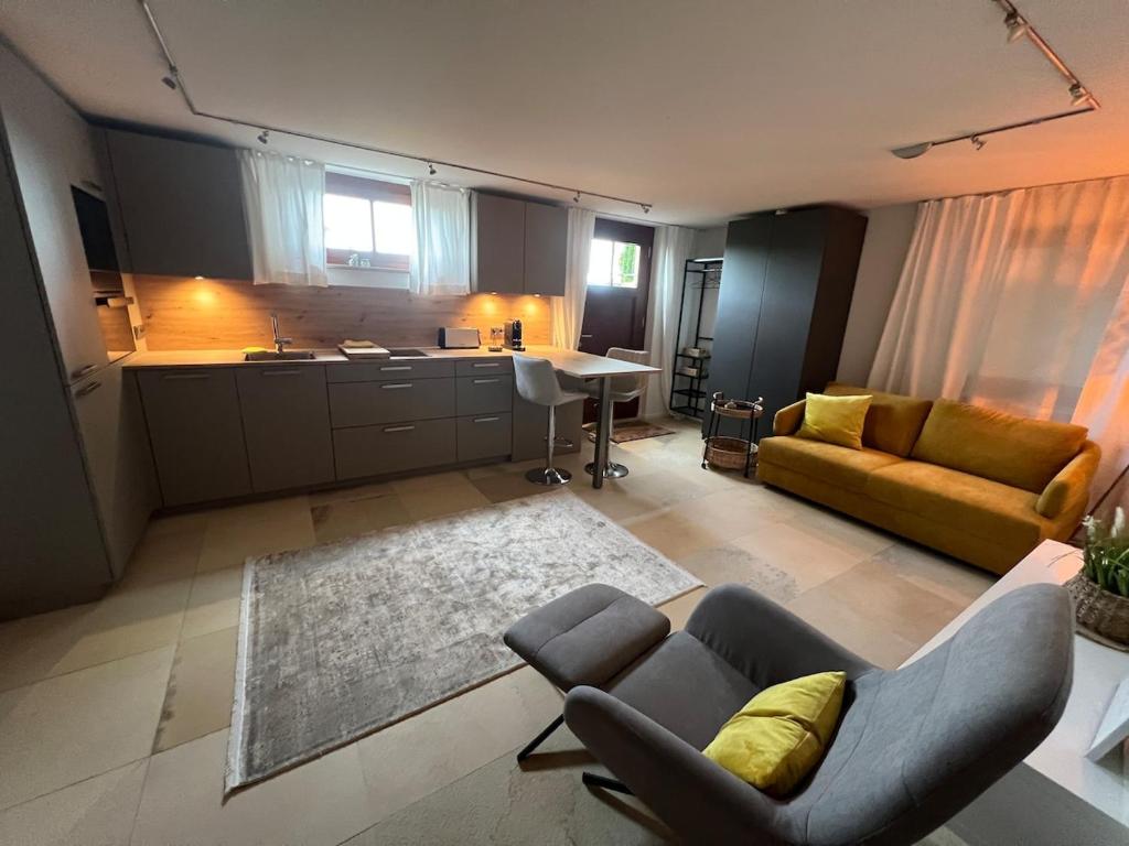a large living room with a couch and a table at Appartement am Rüsberg in Witten