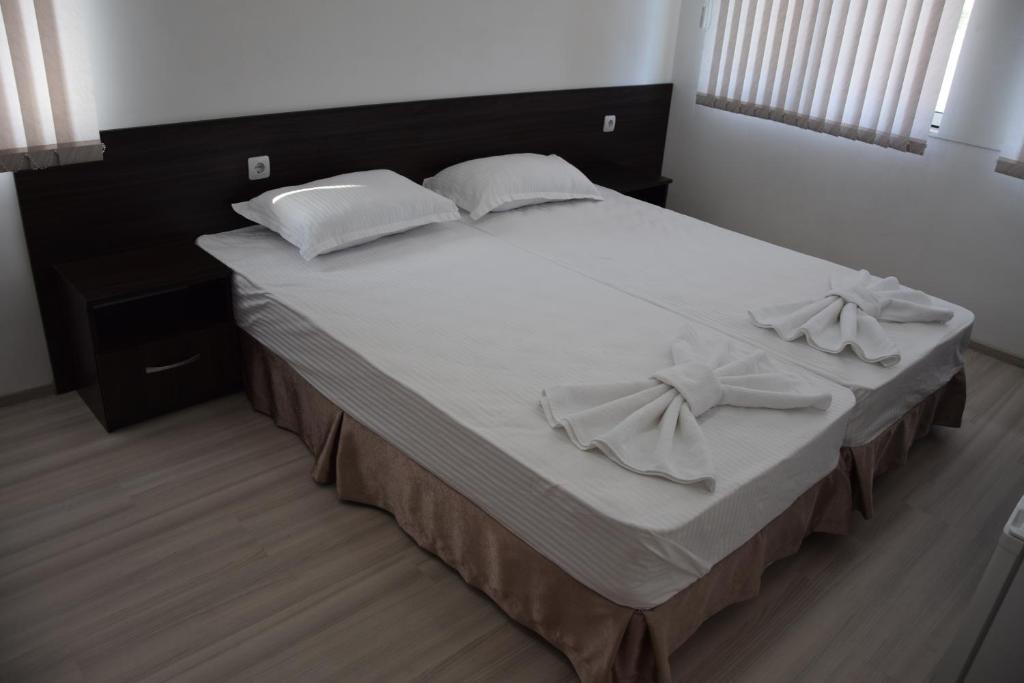 Кровать или кровати в номере Rooms Lina