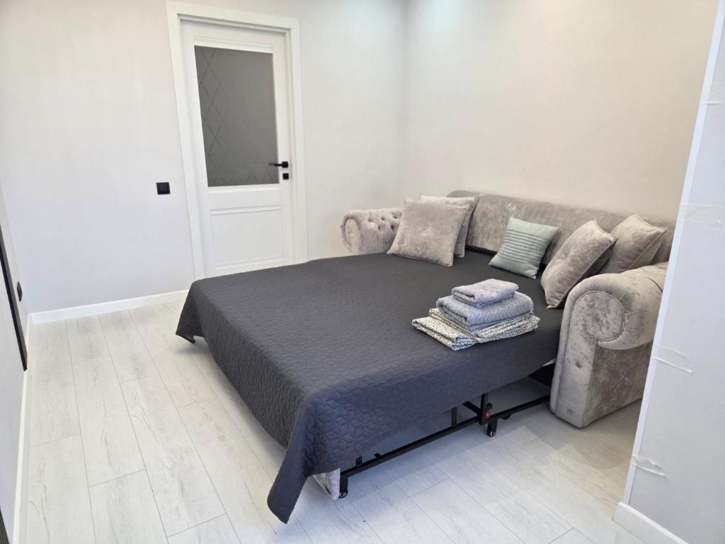 Postel nebo postele na pokoji v ubytování Транзит Сервис 4 Аэропорт- Кишинёв