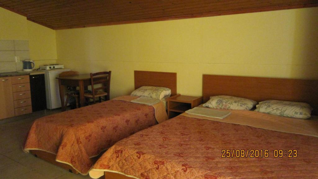 Postel nebo postele na pokoji v ubytování Filia Apartments
