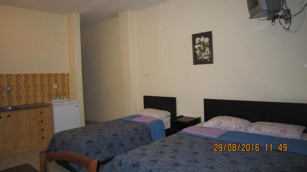 Postel nebo postele na pokoji v ubytování Filia Apartments