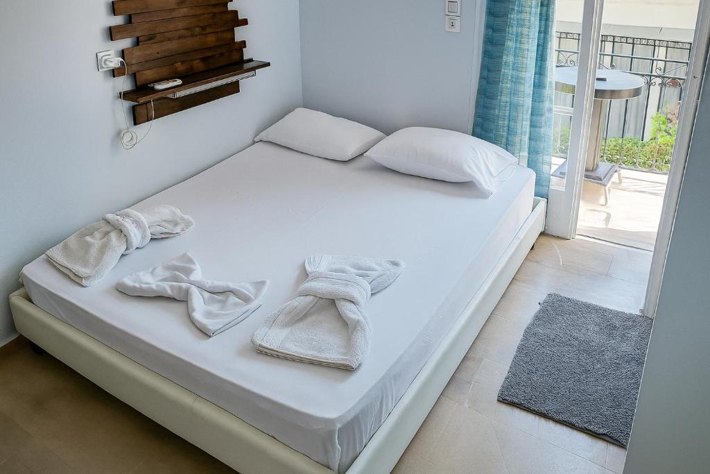 Ένα ή περισσότερα κρεβάτια σε δωμάτιο στο Nafpaktos studio in port Ι