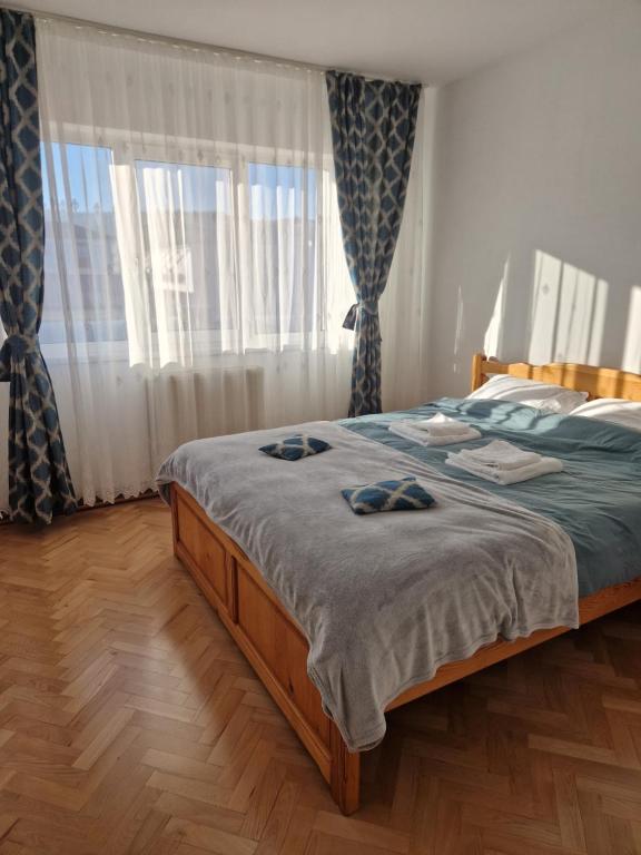 Postel nebo postele na pokoji v ubytování Apartment Eleven