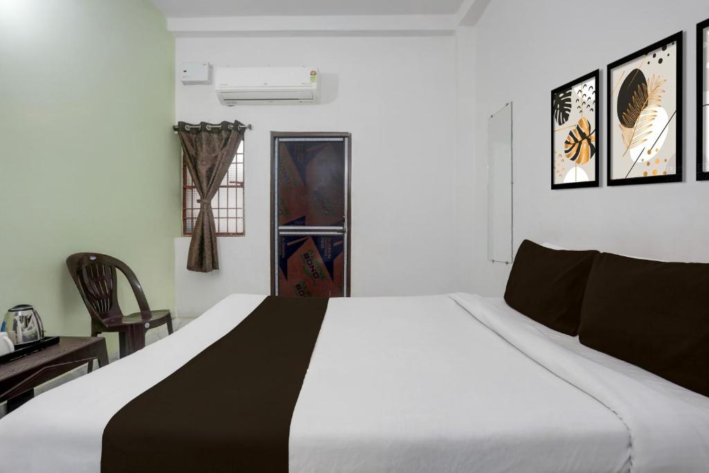 Giường trong phòng chung tại Hotel O Nandan Palace