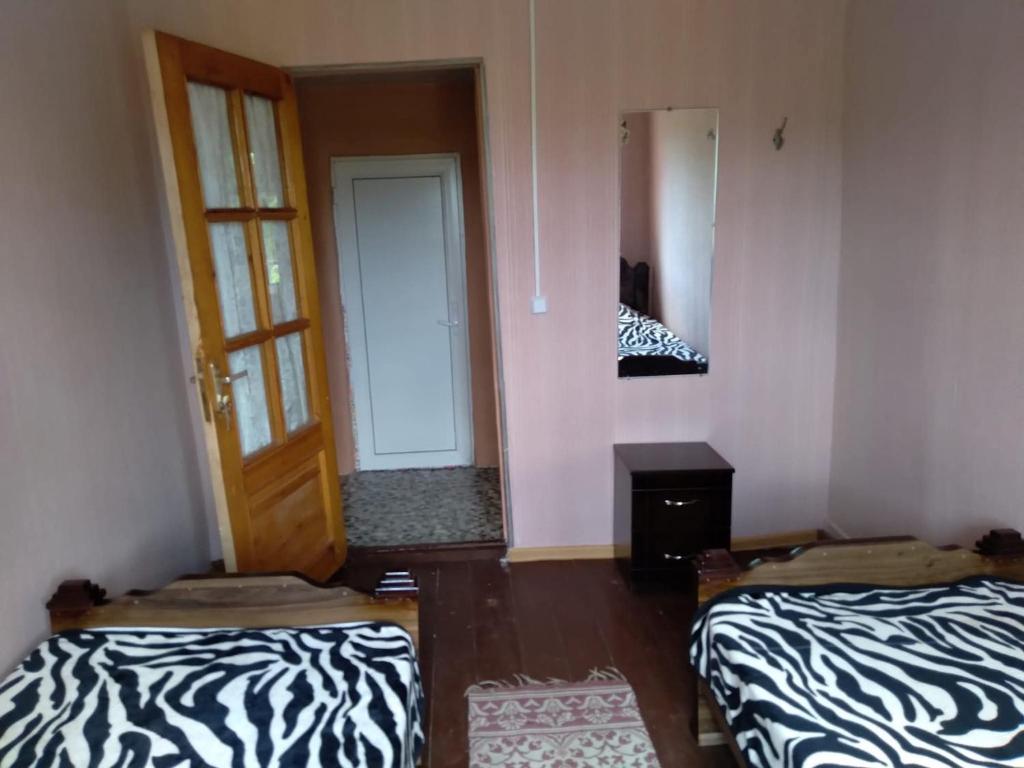 Postel nebo postele na pokoji v ubytování Motena Guesthouse