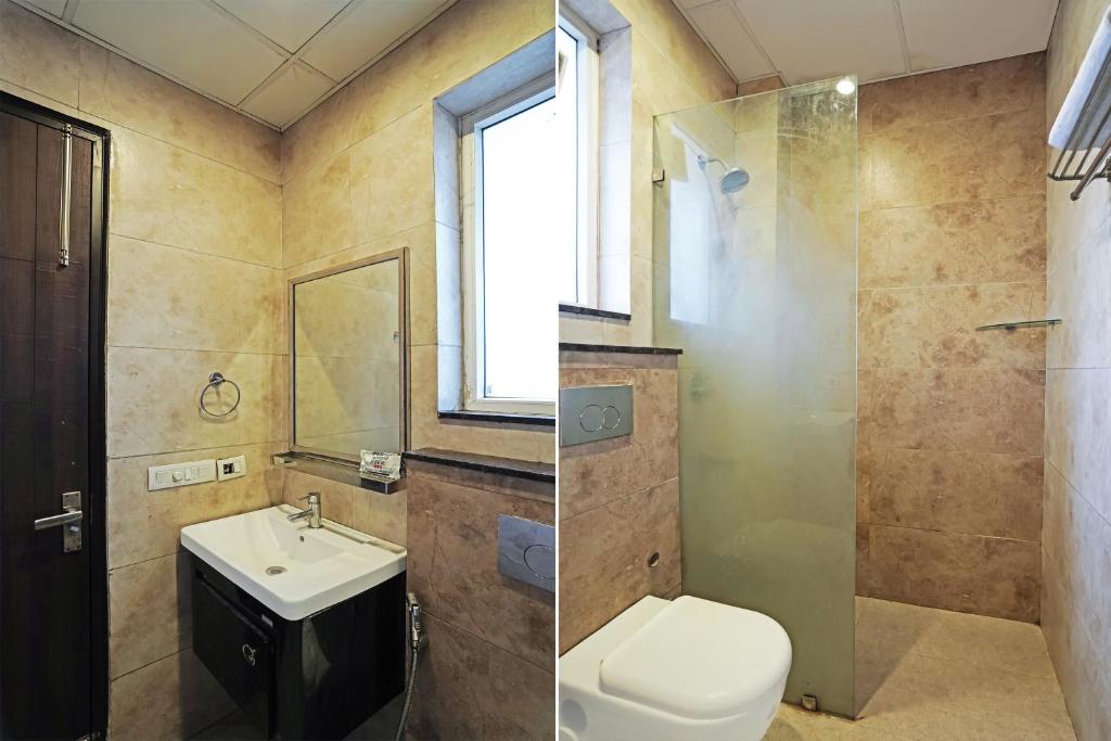 Ένα μπάνιο στο Townhouse Akshay Hotel