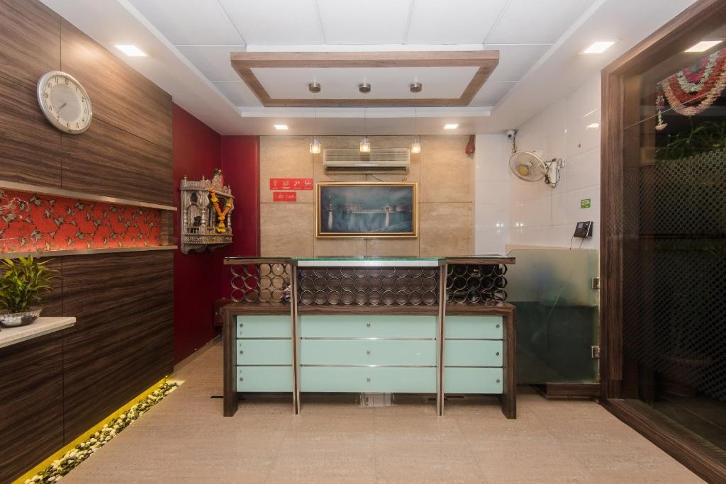 Kuchyň nebo kuchyňský kout v ubytování Hotel O Solitaire