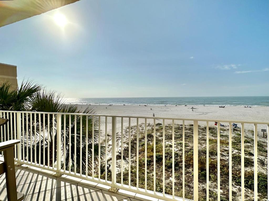 a view of the beach from the balcony of a condo at Chateaus on White Sands 302 in Clearwater Beach
