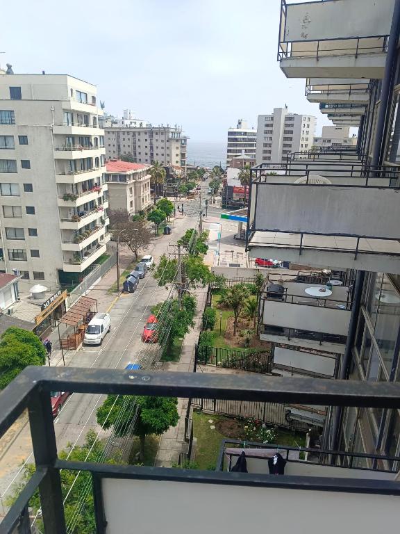 a view of a city street from a building at Departamento Poniente a pasos del casino y playas in Viña del Mar