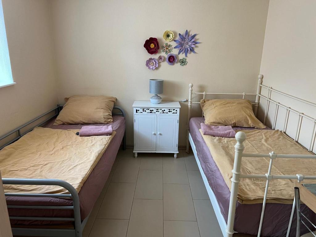 Postel nebo postele na pokoji v ubytování Small Pearl -Tiny House