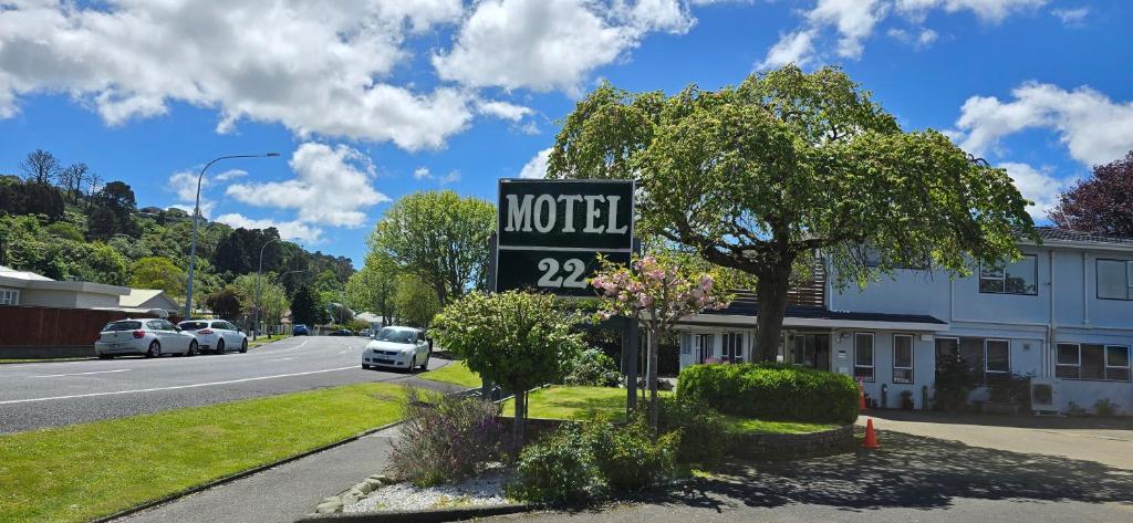 a motel sign on the side of a road at Motel 22 in Lower Hutt