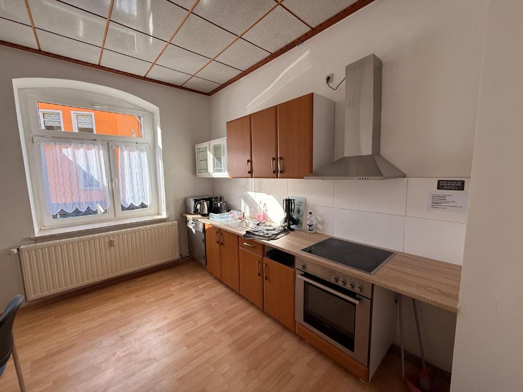 Η κουζίνα ή μικρή κουζίνα στο Ferienwohnung Goldener Drache