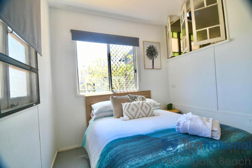 Ένα ή περισσότερα κρεβάτια σε δωμάτιο στο 10 Fifth Avenue