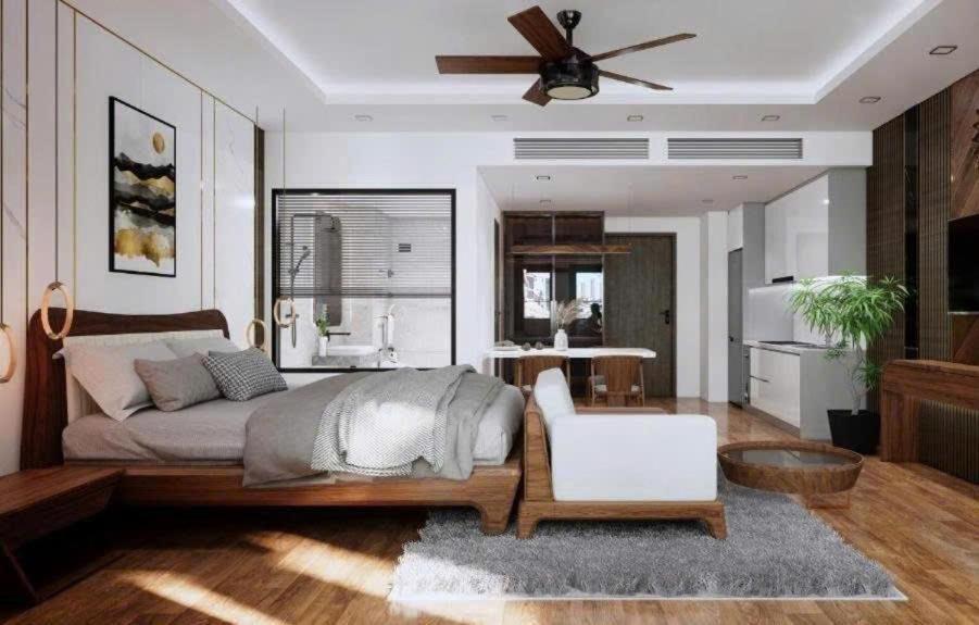 a bedroom with a bed and a ceiling fan at FLC Sea Tower QUY NHƠN-Căn Hộ Du Lịch 5 Sao-Cách Biển 40m-Hồ Bơi-View Biển in Quy Nhon