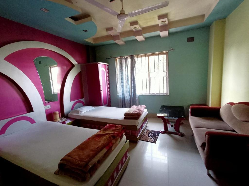 Postel nebo postele na pokoji v ubytování Hotel Sinchula