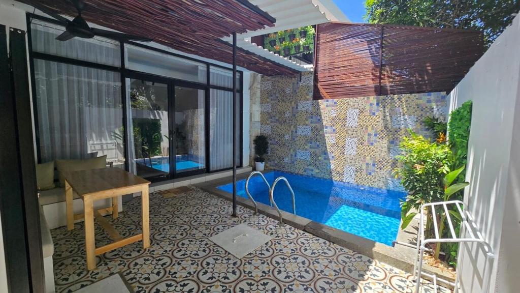 Πισίνα στο ή κοντά στο Villa 3 Green Minimalist 1 Room In Sanur