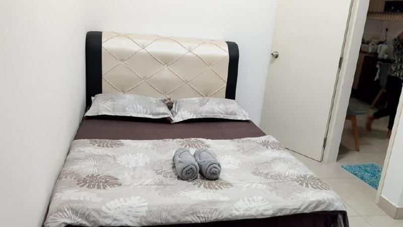 Ένα ή περισσότερα κρεβάτια σε δωμάτιο στο Canopy Hill Kajang 2