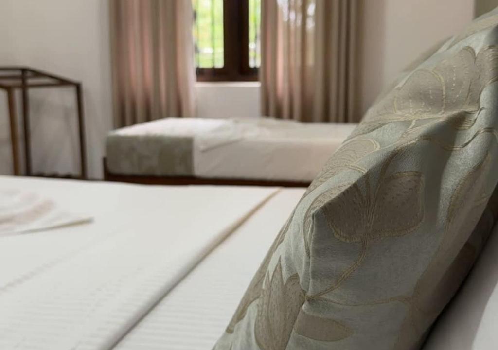 Ένα ή περισσότερα κρεβάτια σε δωμάτιο στο Osara Holiday Home