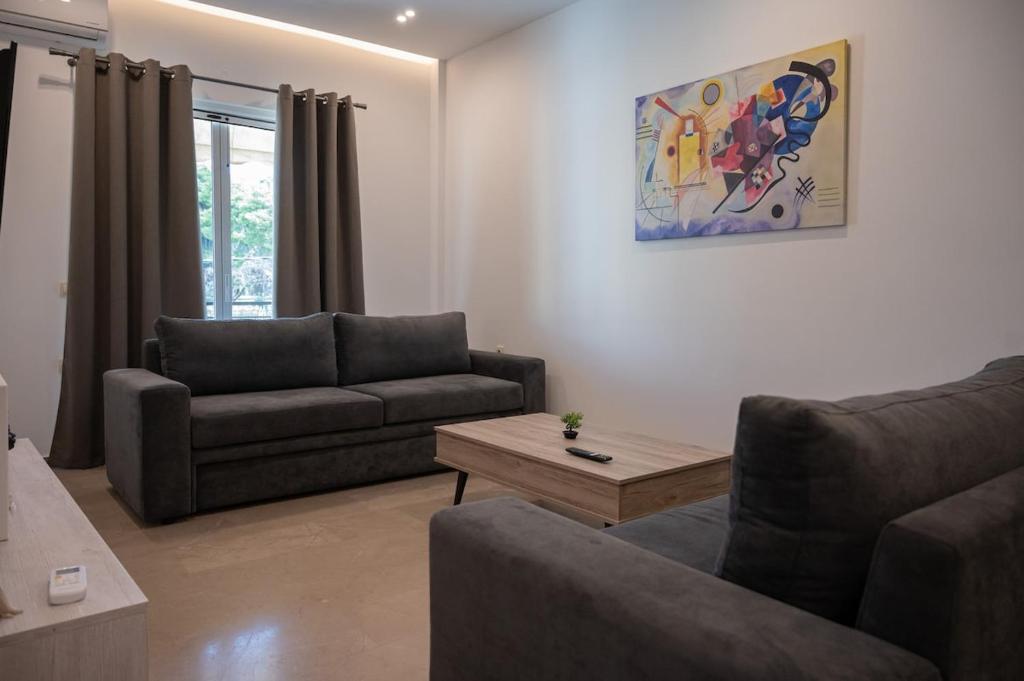 Posezení v ubytování Filoxenia MG Projects Sereno 2 Apartment