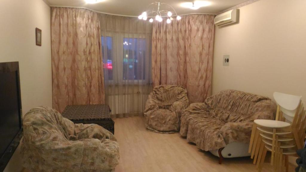 Uma área de estar em Kakhovka 18/1 Apartment
