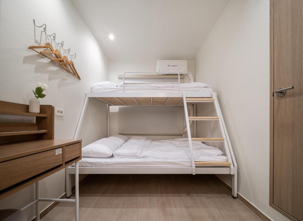 a white bunk bed in a room at staysai 스테이사이 in Samgong