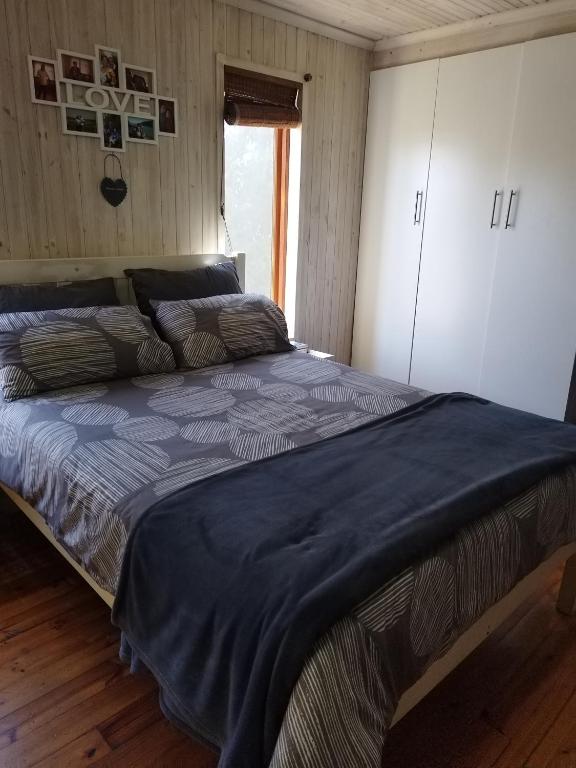 Ένα ή περισσότερα κρεβάτια σε δωμάτιο στο Zen-Vibes Holiday Home