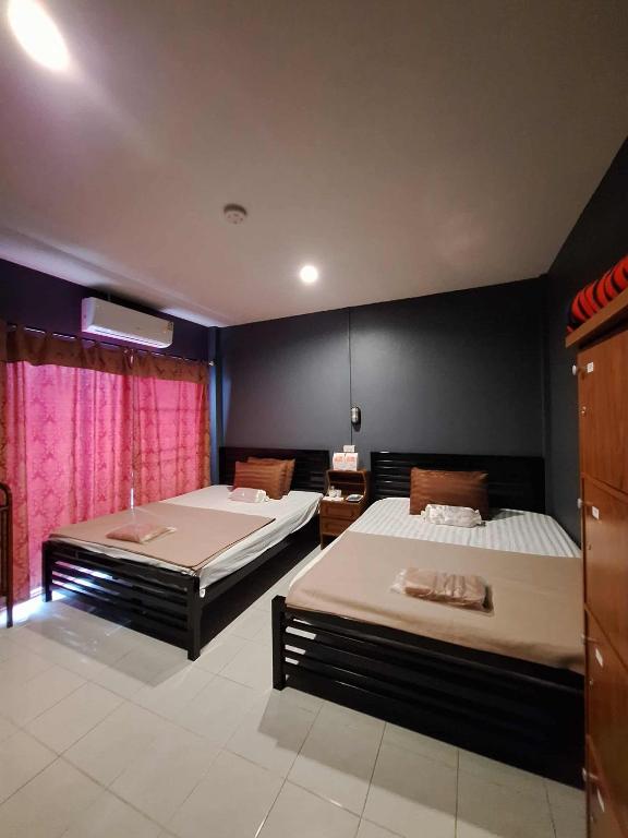 Postel nebo postele na pokoji v ubytování BedCabin