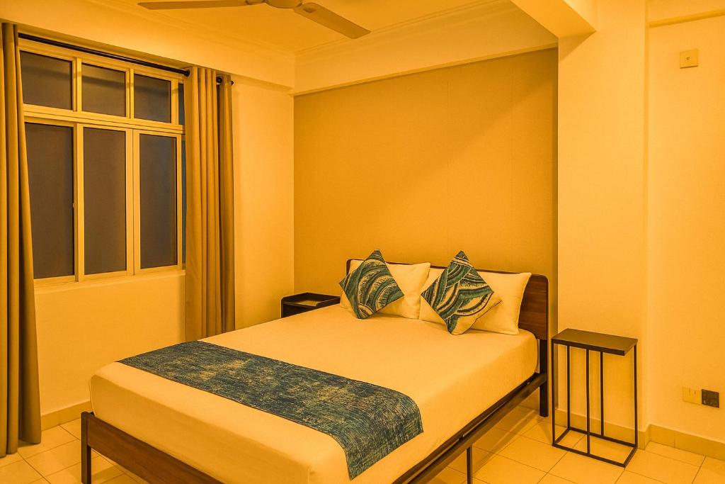 Postel nebo postele na pokoji v ubytování City Inn