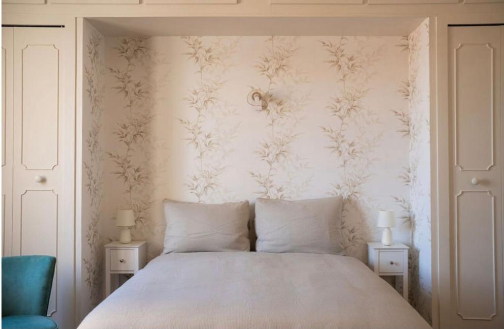 Postel nebo postele na pokoji v ubytování Maison au coeur de Tarbes