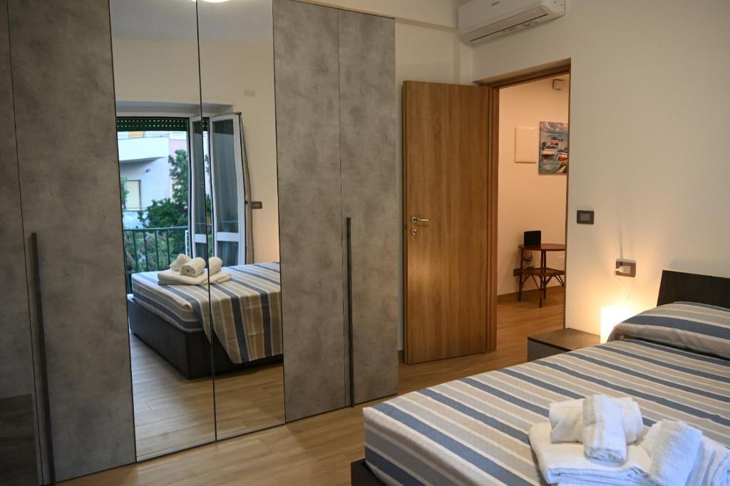 Ένα ή περισσότερα κρεβάτια σε δωμάτιο στο Casa dolce Casa