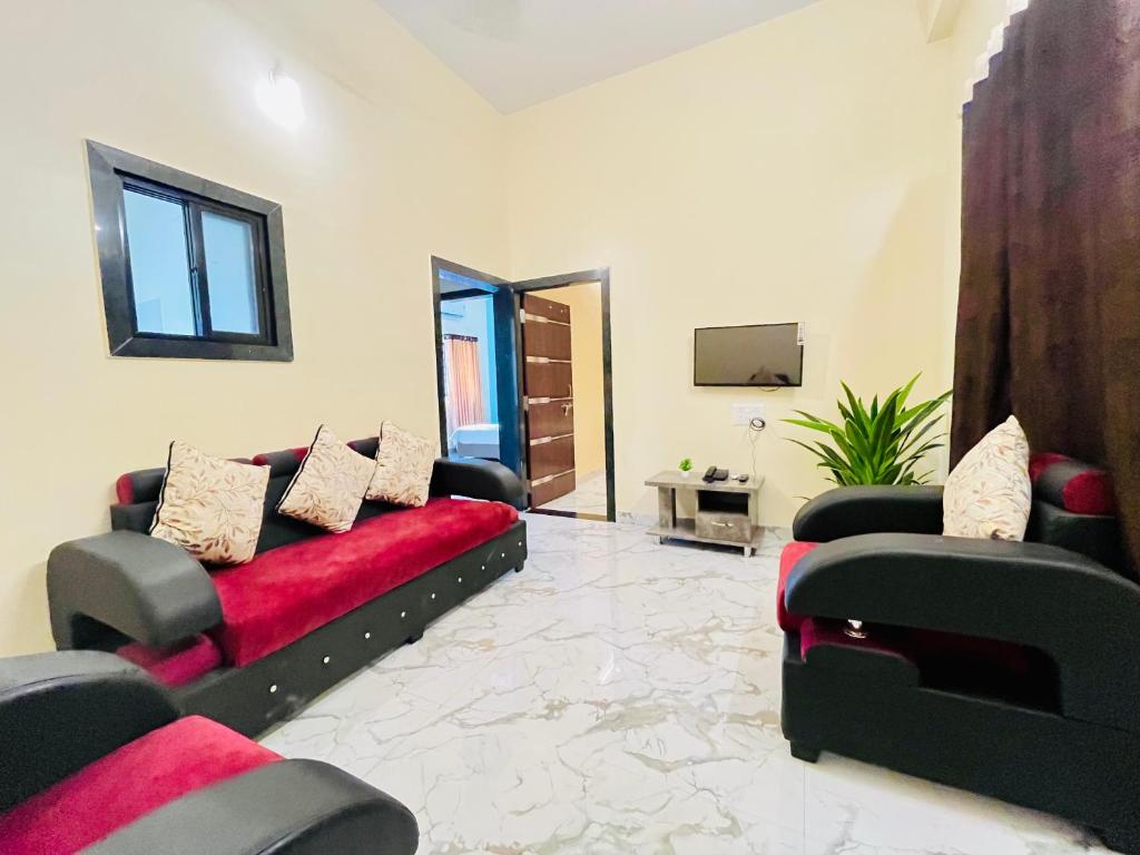 Μια τηλεόραση ή/και κέντρο ψυχαγωγίας στο Hotel Sai 9 Heaven A Quality Apartment Perfect for Families