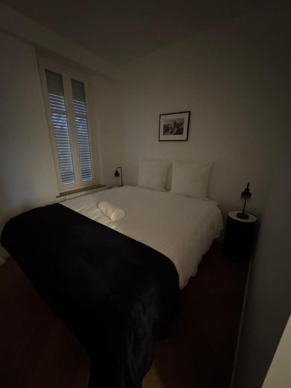 Ένα ή περισσότερα κρεβάτια σε δωμάτιο στο La suite du parc 2