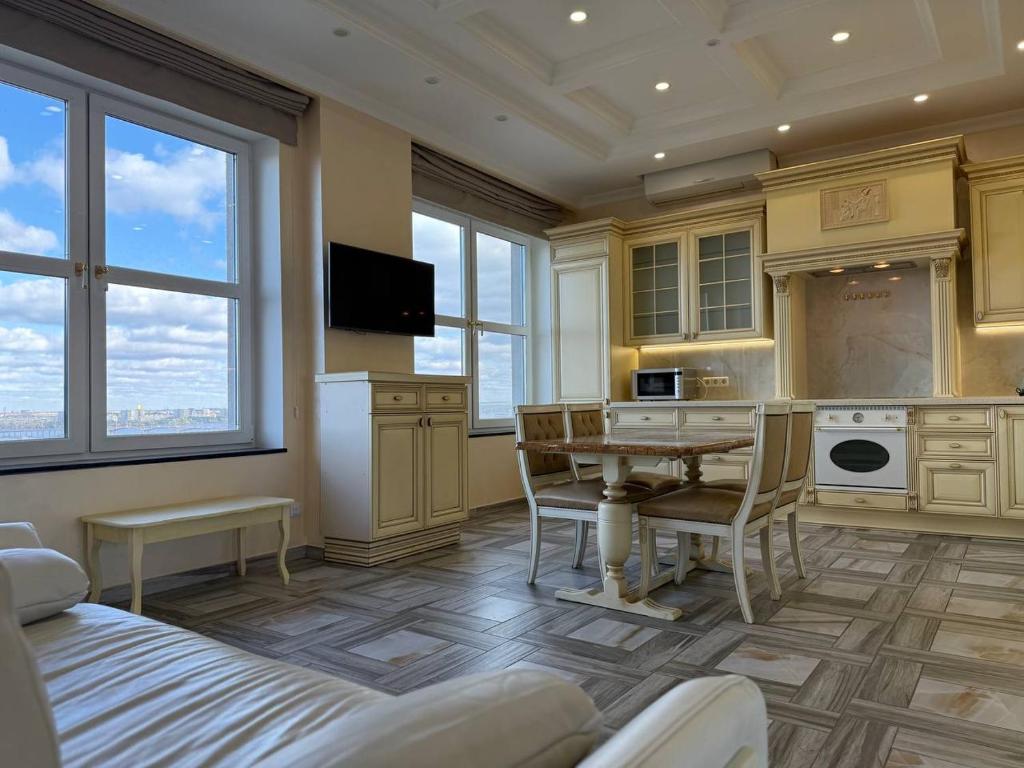 Η κουζίνα ή μικρή κουζίνα στο Дельмар Миронова Европейская 9 А