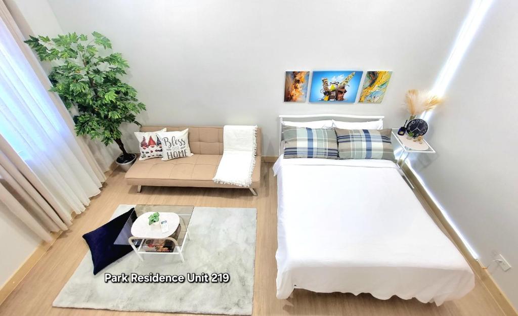 PARK RESIDENCE Unit 219, SM City Santa Rosa, Laguna, by SMDCにあるベッド