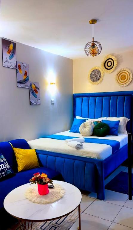 Ένα ή περισσότερα κρεβάτια σε δωμάτιο στο Fitbull Homes Rm 210