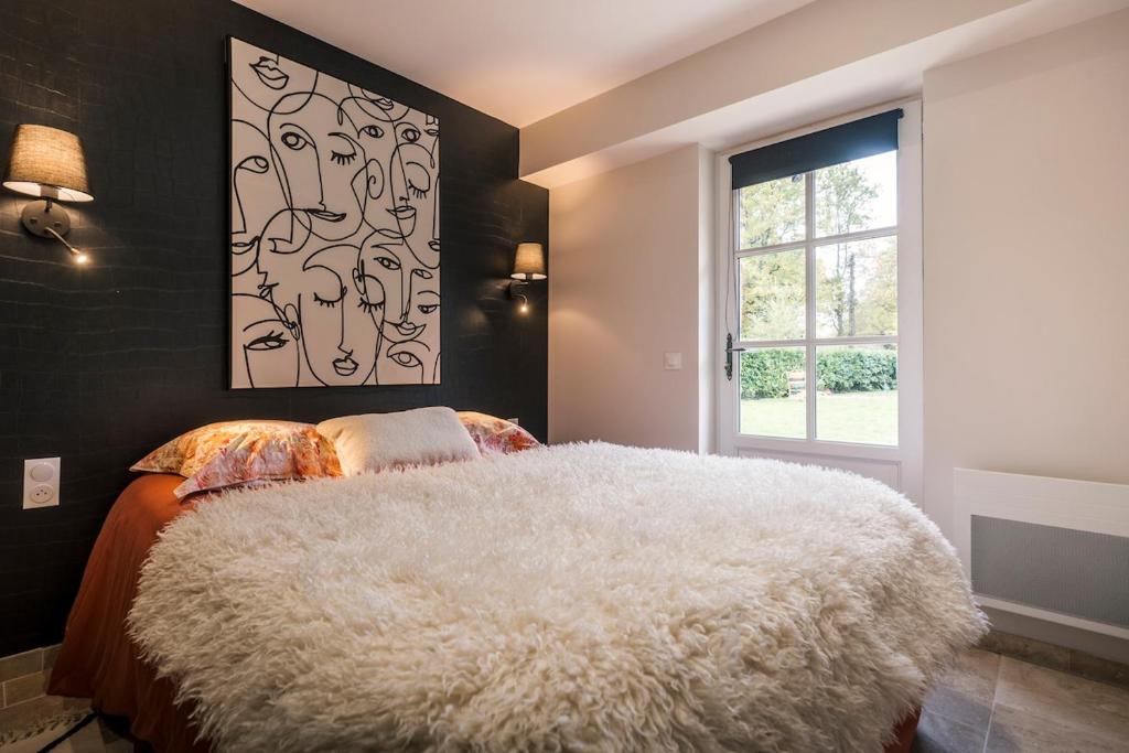 Postel nebo postele na pokoji v ubytování Gîte du Dreuillet Charme & nature en Sologne