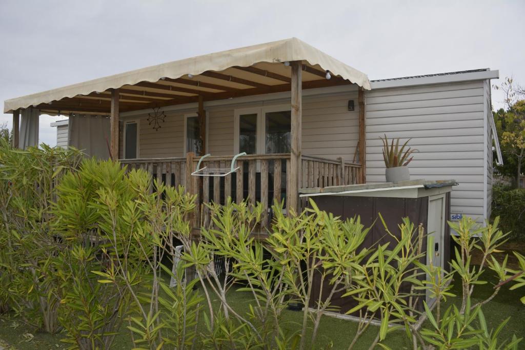 Κήπος έξω από το Chez lolo 7 à 8 personnes