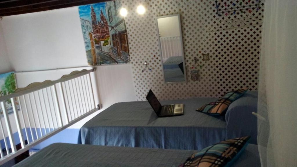 Katil atau katil-katil dalam bilik di Loft Centro Histórico Arucas