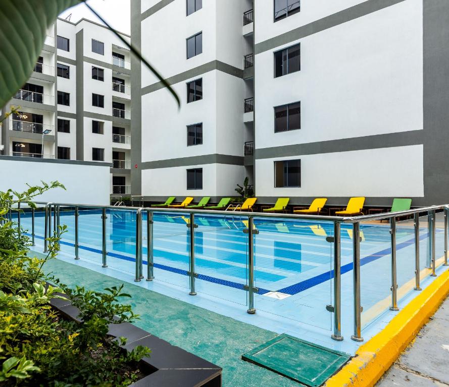 Πισίνα στο ή κοντά στο New Rise Apartment