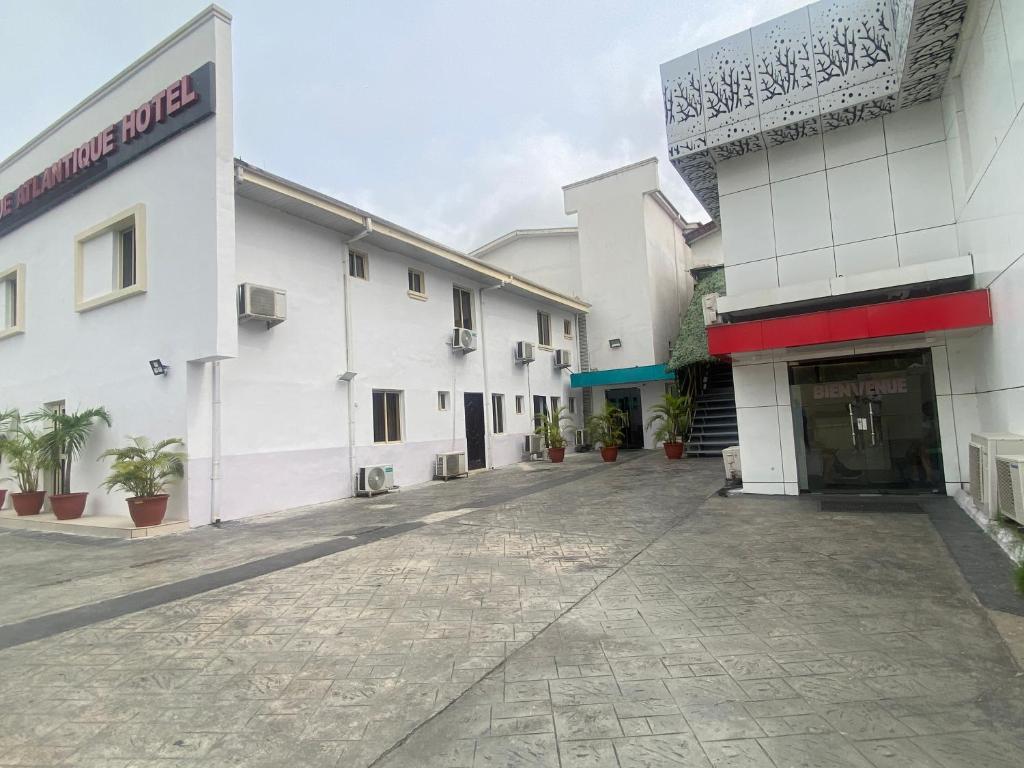 an empty street in front of a building at Chateux de atlantique Hotel in Lagos