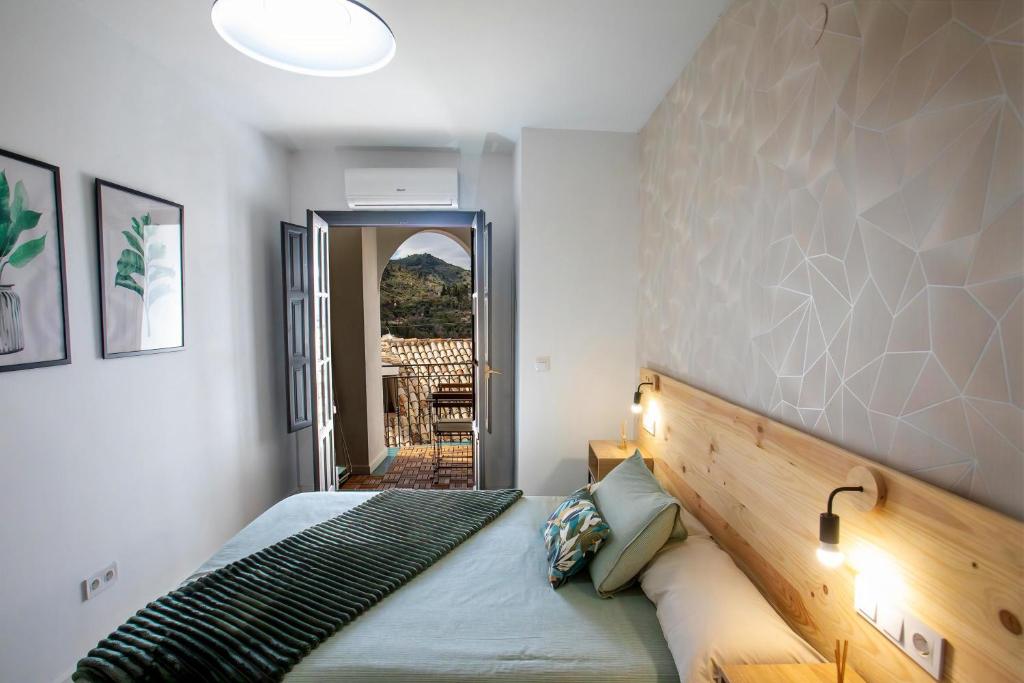 Postel nebo postele na pokoji v ubytování Apartamento Coque, preciosas vistas a la montaña