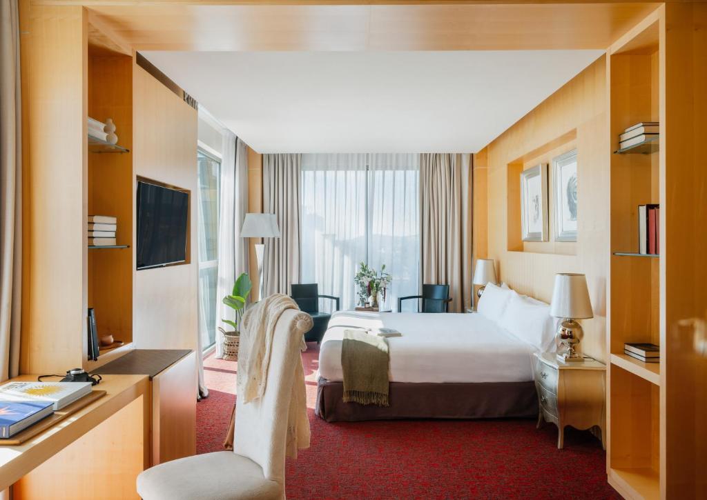 Ένα ή περισσότερα κρεβάτια σε δωμάτιο στο MIM Sitges Member of Melia Collection